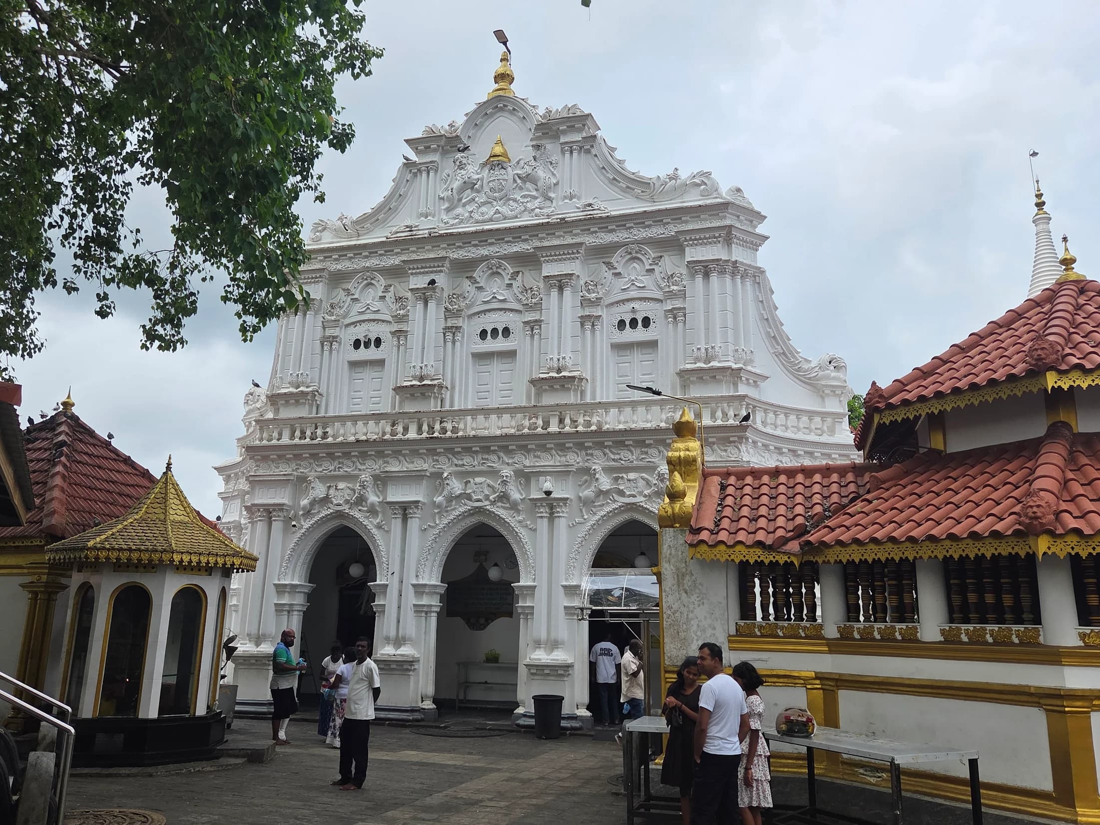 Intricate wall painting depicting Buddha's life inside Kande Viharaya Image House