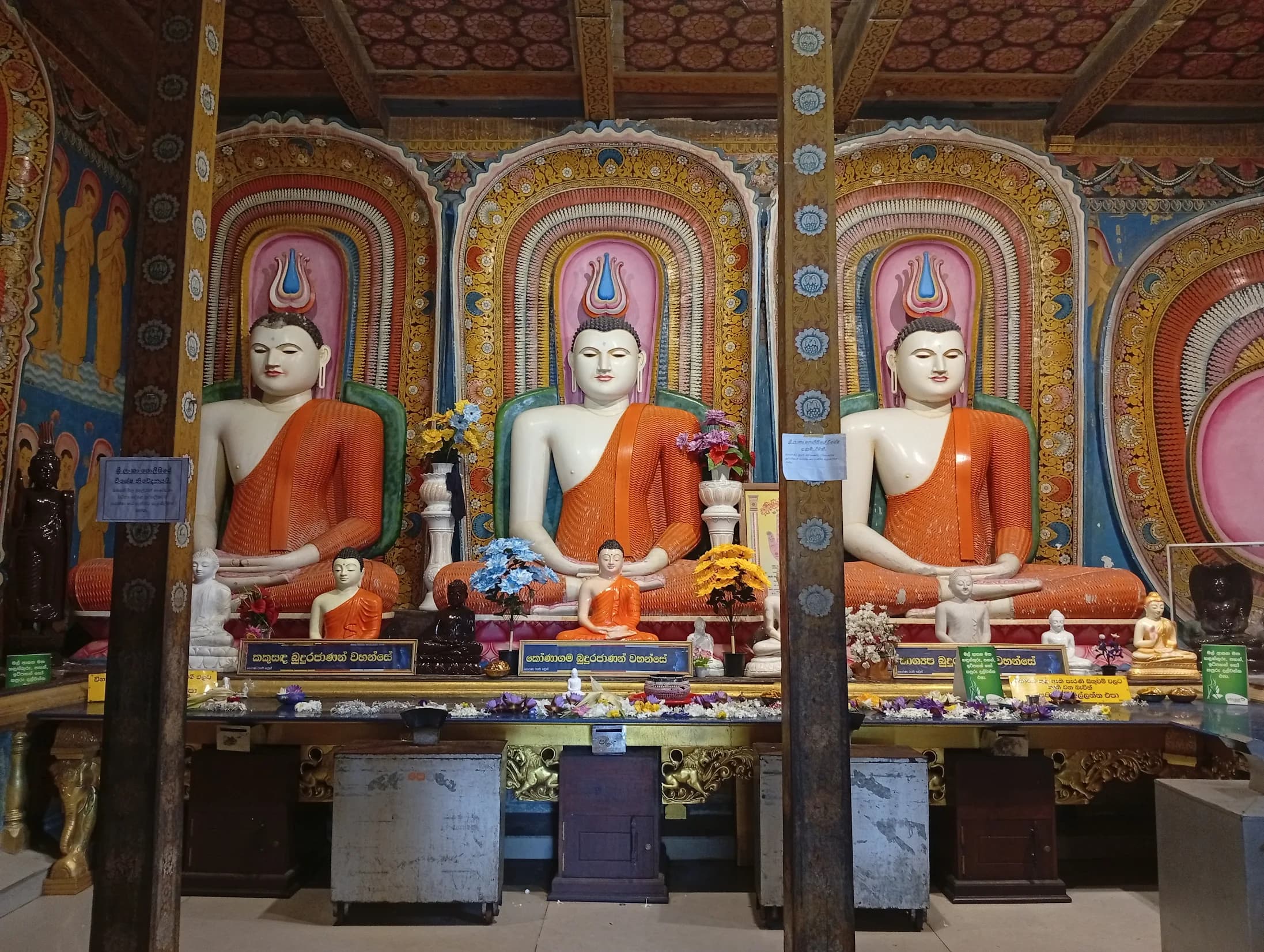 Intricate wall painting depicting Buddha's life inside Kande Viharaya Image House