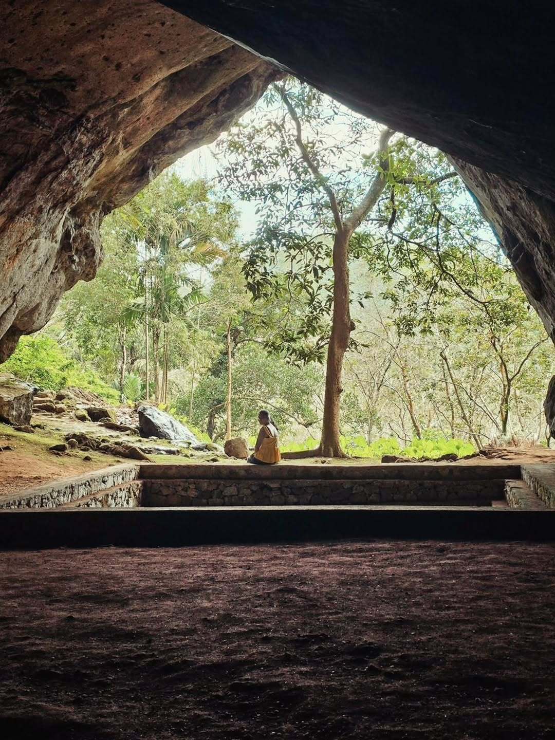 Ancient cave paintings in the first cave showing intricate Buddhist artwork