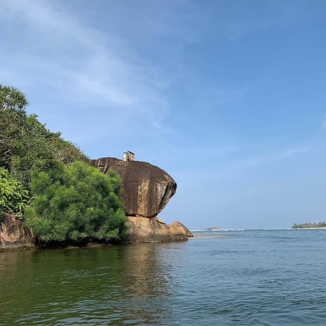 Bentota River with golden sand and clear waters