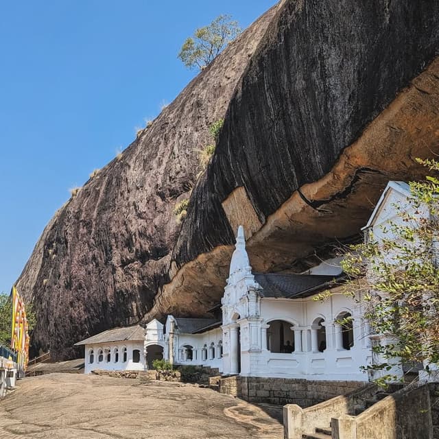 Dambulla Cave Temple showing ancient Buddhist statues and paintings inside rock caves