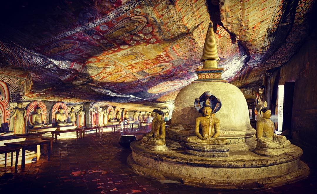 The first cave of Dambulla showing the reclining Buddha statue