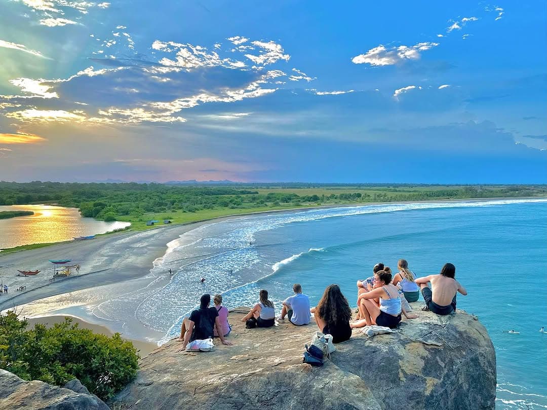 Elephant Rock formation with elephants grazing nearby
