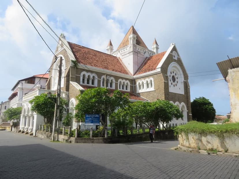 Interior of Dutch Reformed Church in Galle Fort showing colonial architecture and historical tombstones