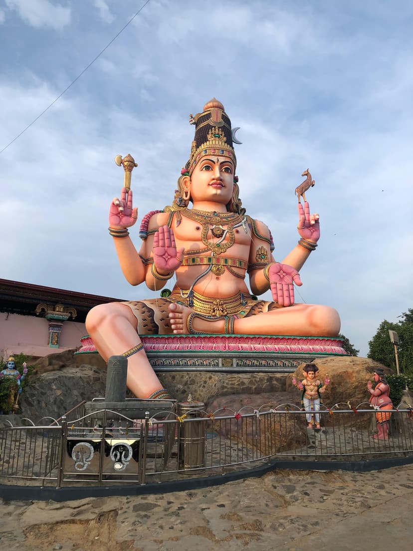 Koneswaram Temple perched on Swami Rock cliff overlooking the Indian Ocean with colorful gopuram