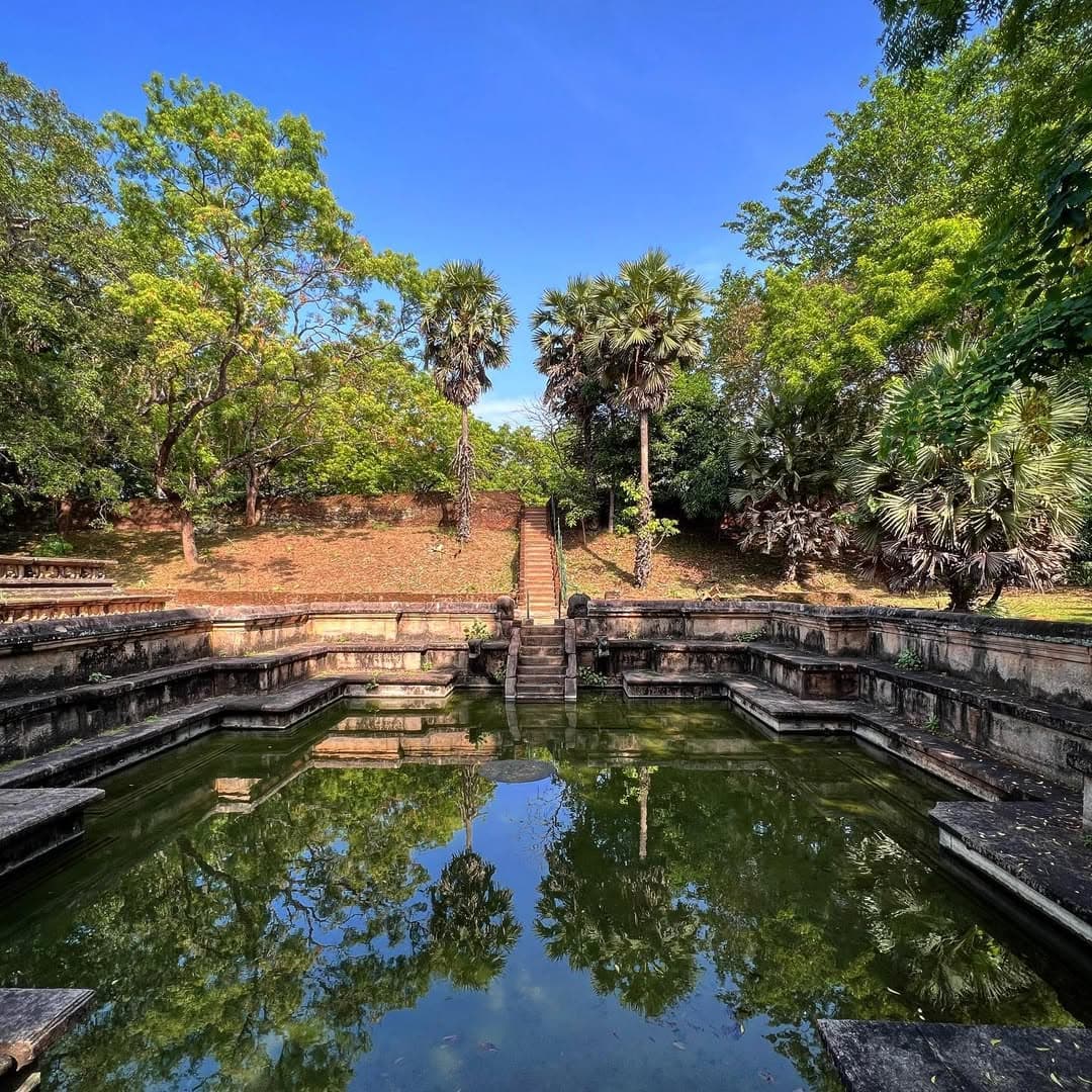 Intricate stone carvings at Kumara Pokuna