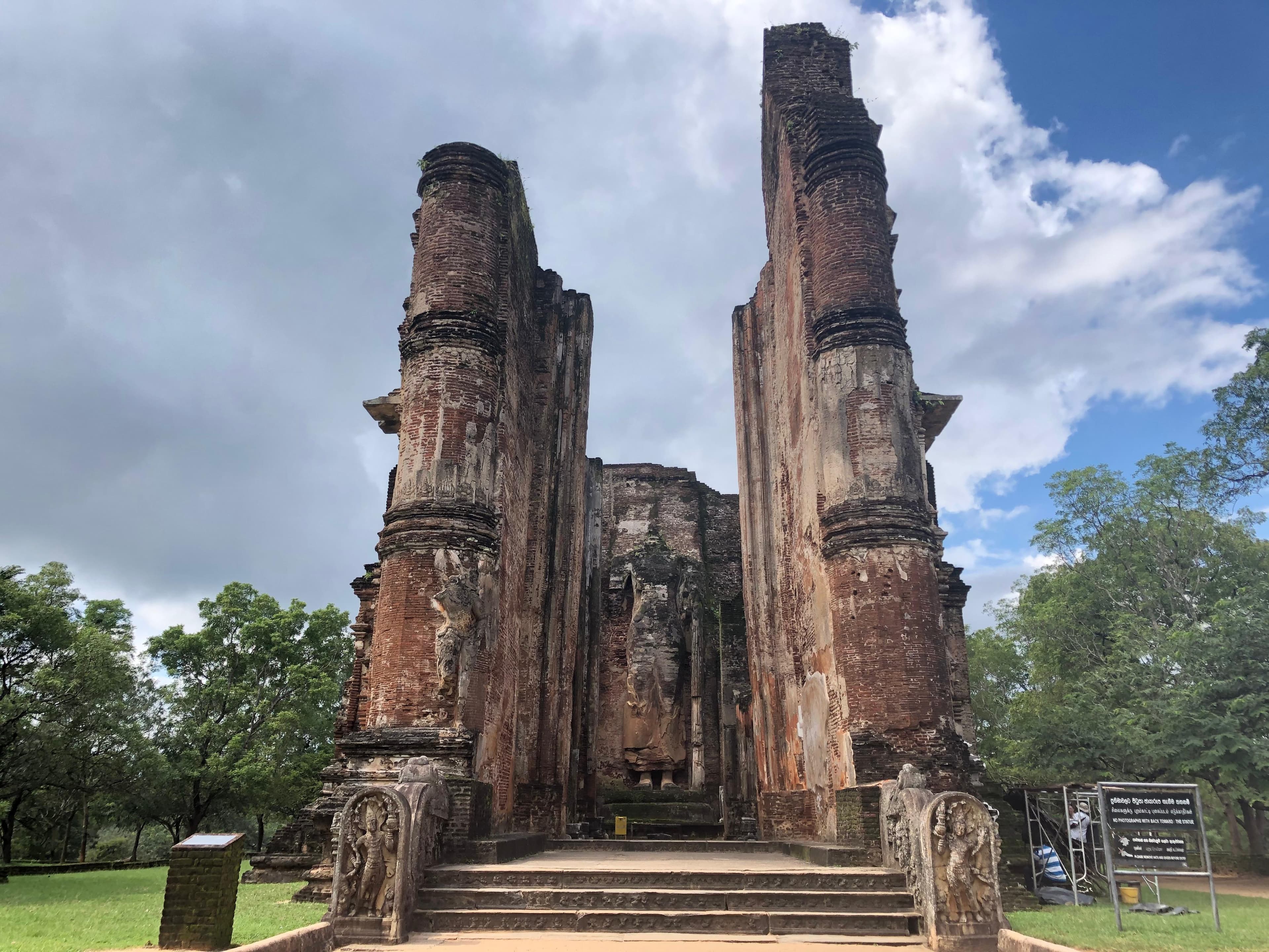 Interior view with headless Buddha statue