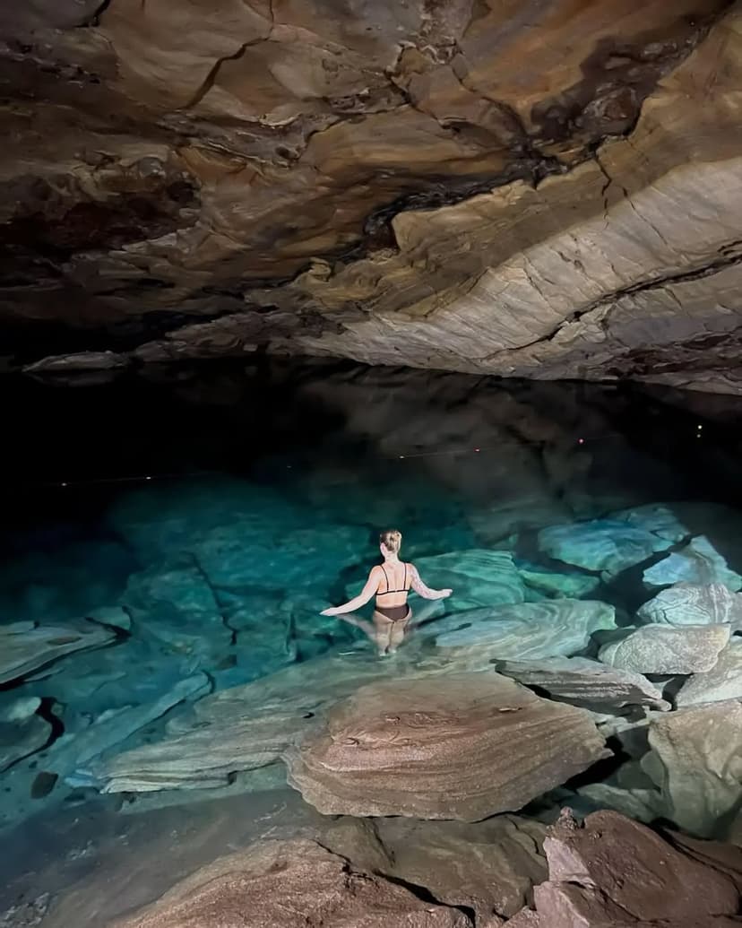 Scenic view of Nil Diya Pokuna natural pool surrounded by forest