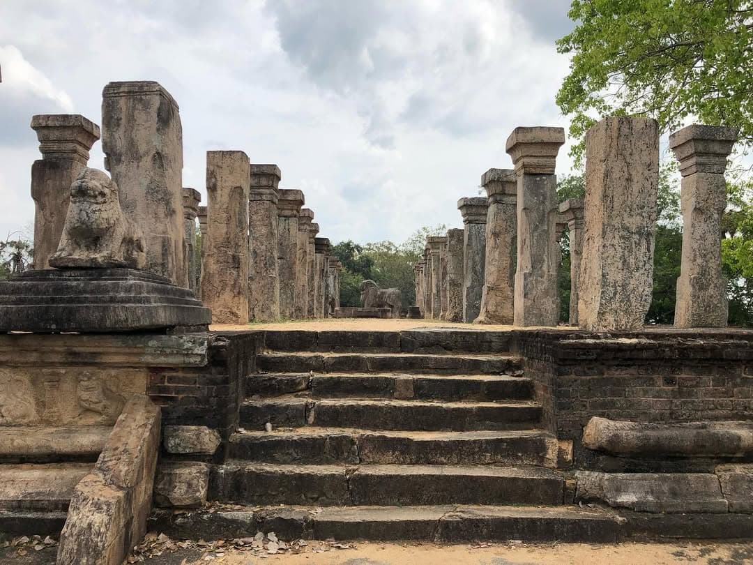 Close-up of intricately carved lotus pillars at the Audience Hall