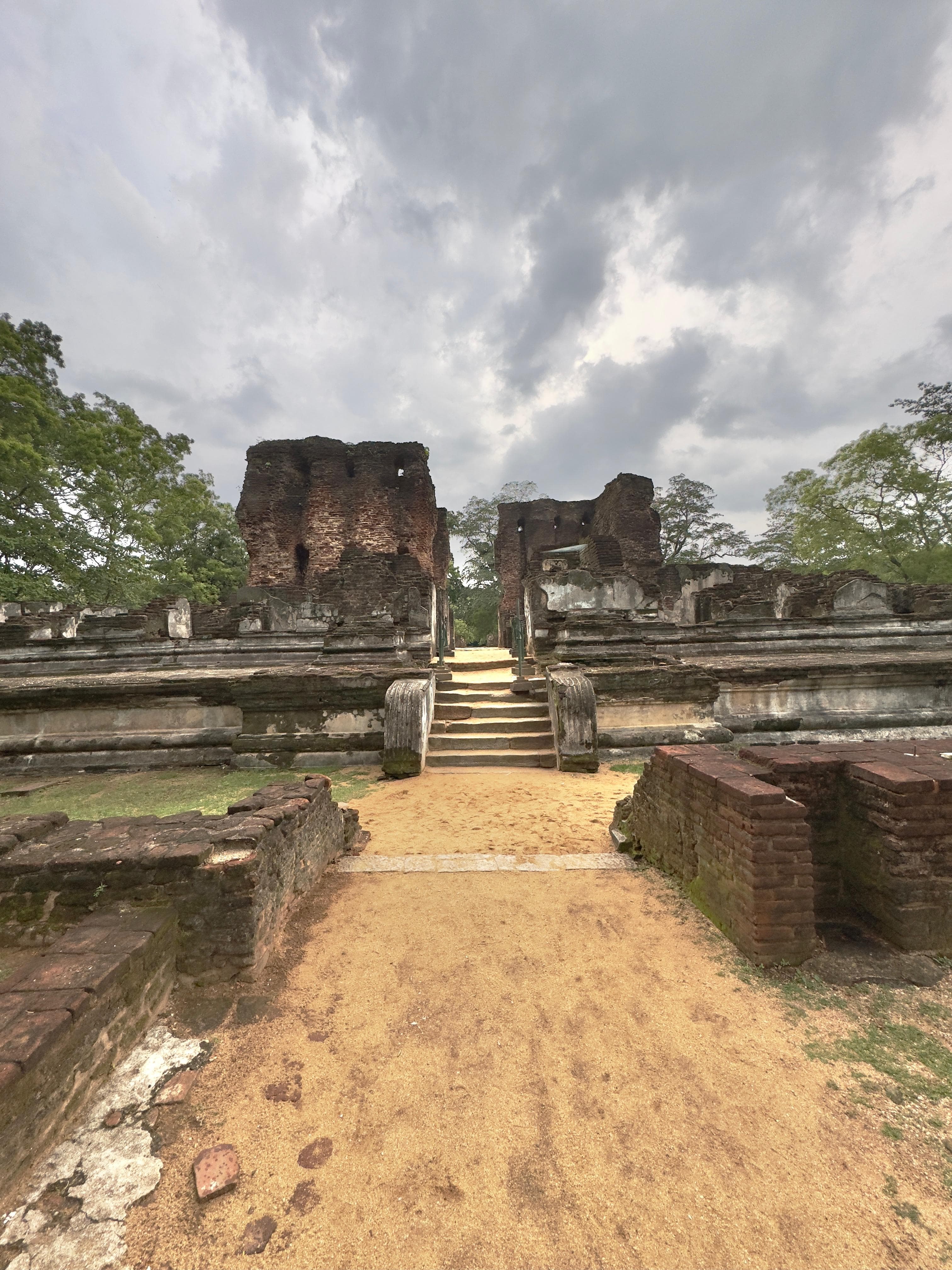 Ancient ruins of Polonnaruwa showing stone temples and statues