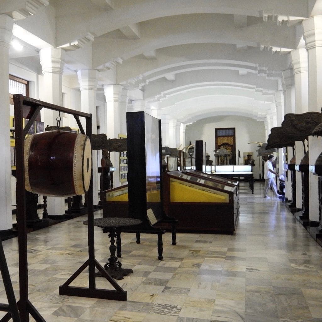 Temple museum displaying ancient Buddha statues and religious artifacts